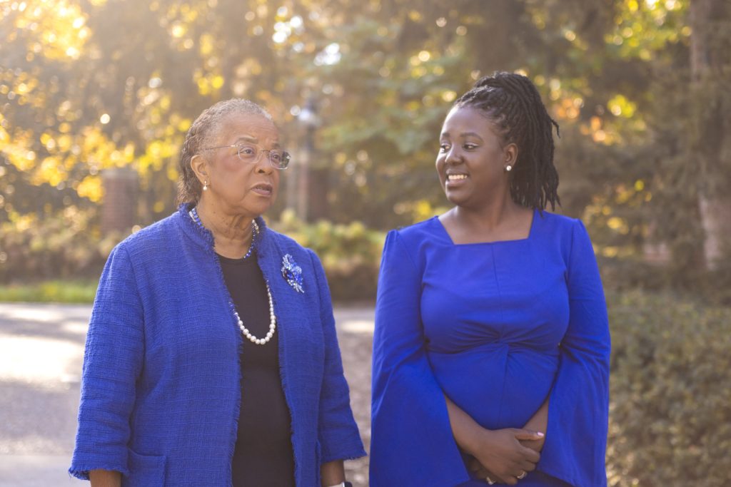 Rujeko Machinga-Asaolu and Elaine Wilson walking and talking