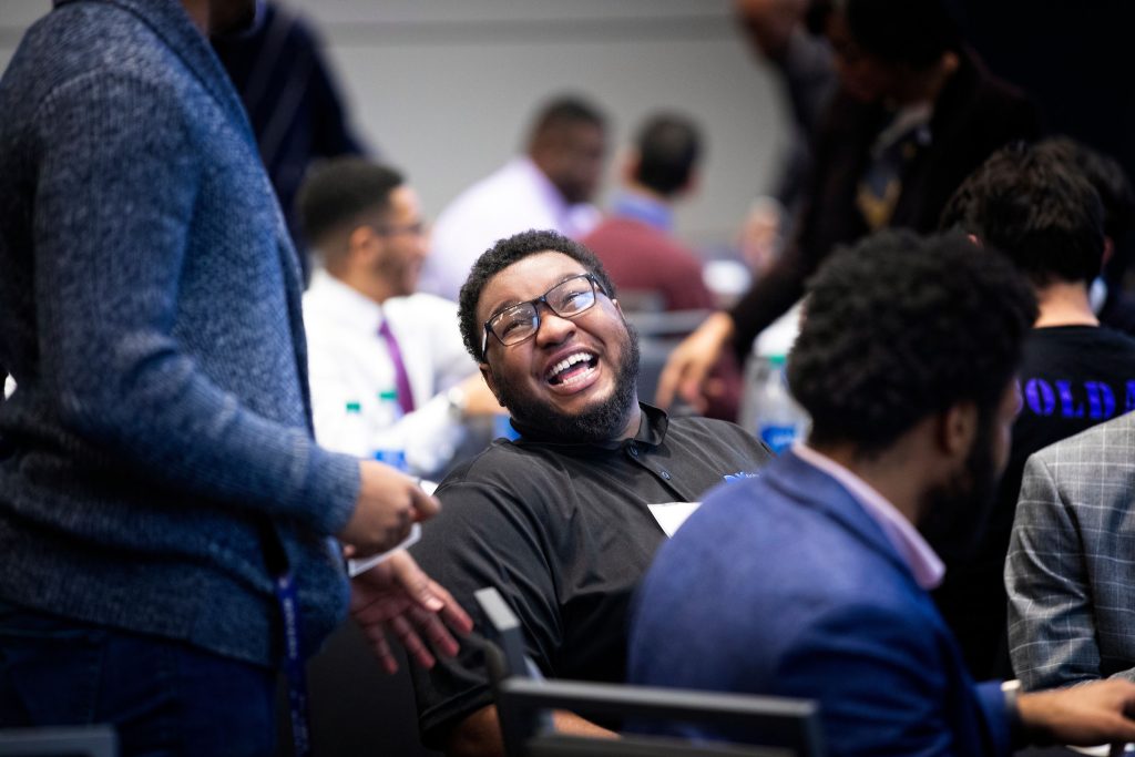 Student smiling and laughing