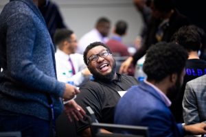 Student smiling and laughing