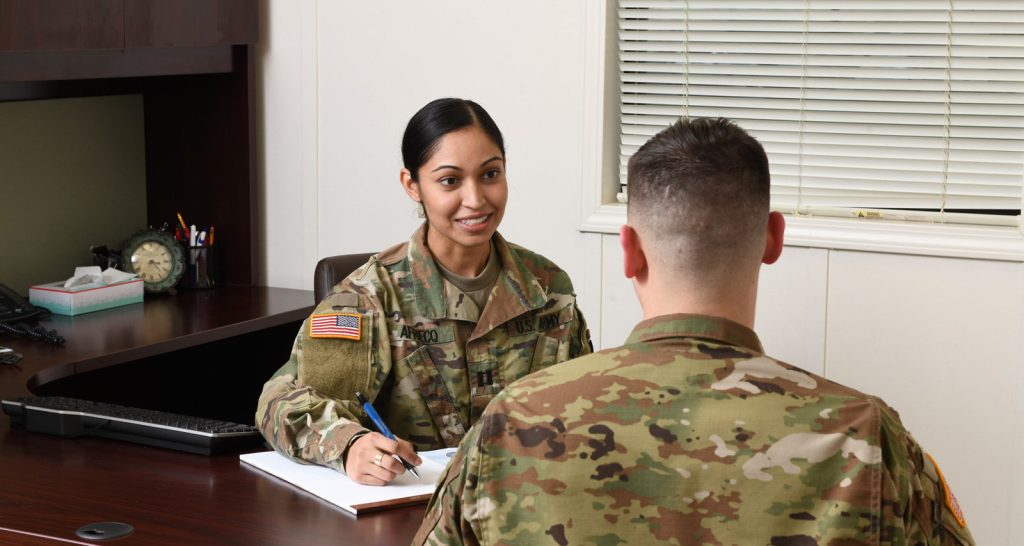 Two Army Officers meeting in office