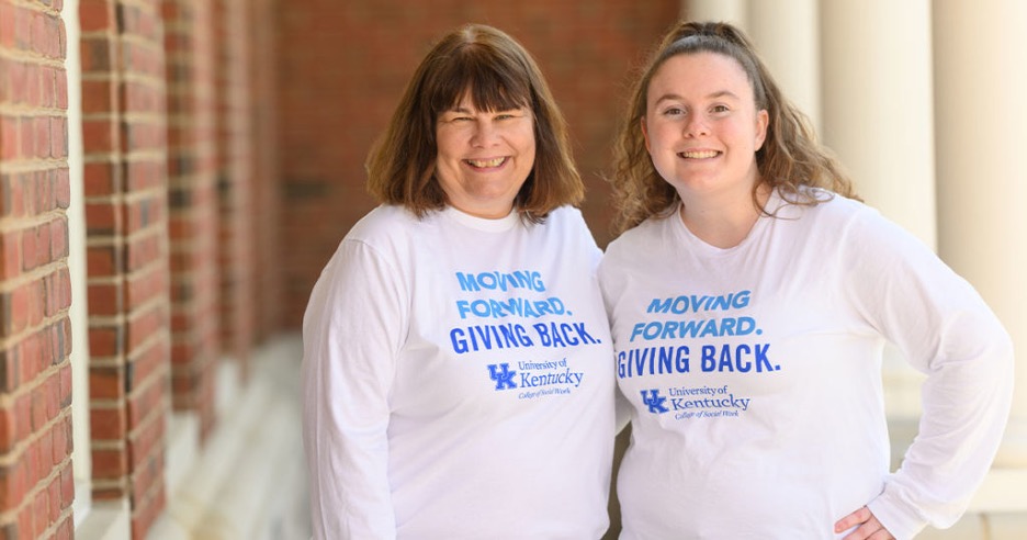 Alumni-Student mentoring pair in SWAA t-shirts