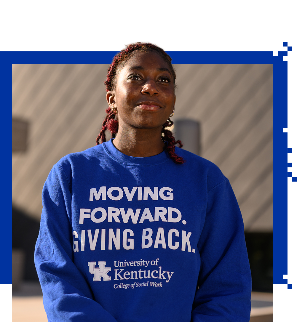 Student Makari Murphy smiling and looking into the distance